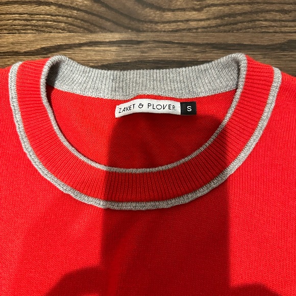 Red sweater w/ lightning bolts on arm - Picture 3 of 6